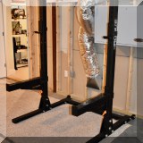 X05. Rogue Monster Lite squat rack. 
